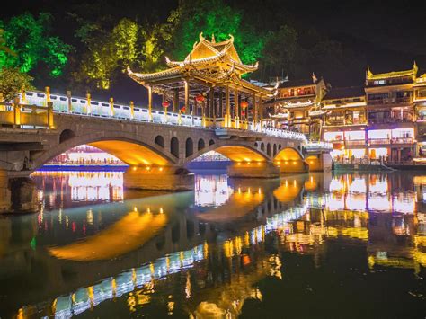 The Majestic Fenghuang Mountain Ancient Village: A Journey Through Time and Breathtaking Beauty!