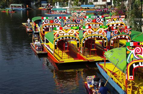 Xochimilco Boats: Floating Gardens and Vibrant mariachi Music!